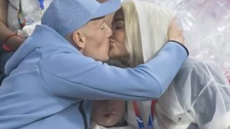 Megan Pickford says ‘sorry’ to son Arlo, 7, for being stuck in the middle of her passionate kiss with England star goalie Jordan to celebrate his ‘magic’ World Cup performance