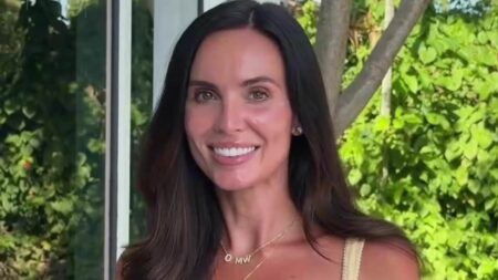 England WAG Ellie Watkins poses in a lemon yellow bikini as she cashes in on the World Cup by promoting premium sun care brand
