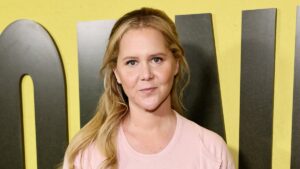 Amy Schumer shows off weight loss in bikini as she reveals why she’s a ‘warrior’… after going viral for slamming Taylor Swift’s wedding