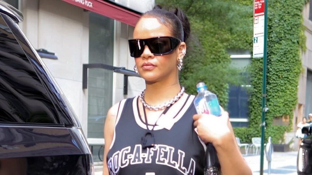 Rihanna supports Jay-Z with her jersey as she heads to his Yankee Stadium concert amid performance rumors