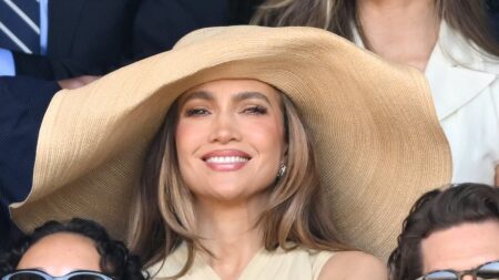 Jennifer Lopez’s giant Wimbledon sunhat is branded ‘inappropriate’ as she blocks the view while enjoying her fashion moment