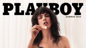 Cara Delevingne bares all as she ditches her underwear and poses in a plunging PVC corset as the first lesbian to cover Playboy magazine