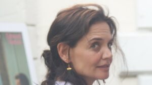 Does Katie Holmes have a toyboy? Tom Cruise’s ex, 47, holds hands with hunky artist nearly 10 years her junior in the Hamptons