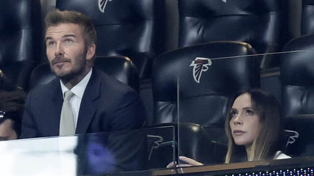 David Beckham looks nervous as he arrives in the stands with wife Victoria and their family ahead of England vs Argentina World Cup semi-final