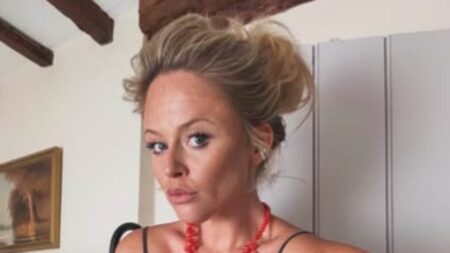 Emily Atack shows off her slimmed-down frame in a black dress while her shirtless fiancé Alistair Garner gets stuck into some gardening at their new home