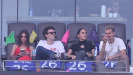 Romeo and Cruz Beckham are joined by their girlfriends Kim Turnbull and Jackie Apostel as they arrive at the World Cup final