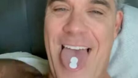 Robbie Williams pokes fun at viral World Cup moment after fans saw ‘white substance falling on microphone’ live on TV