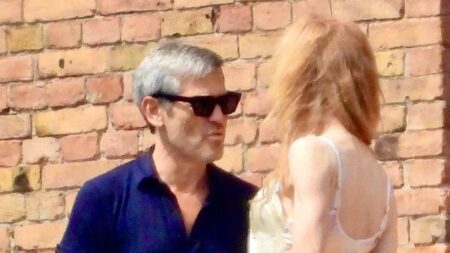 Nicole Kidman spotted with a mystery man outside Italian hotel as she continues her lavish summer vacation… seven months after Keith Urban divorce