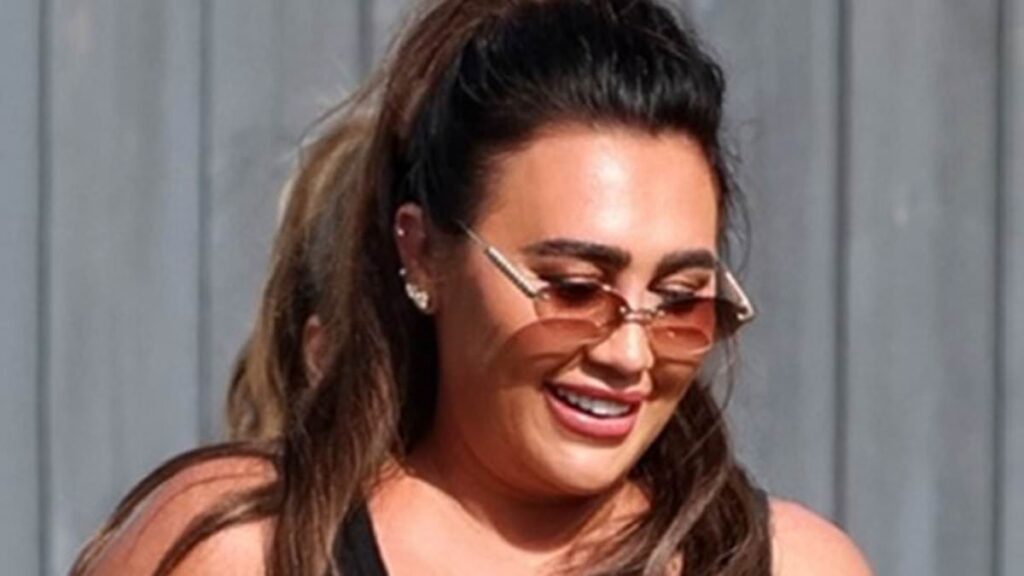 TOWIE’s Lauren Goodger is clad in head to toe designer gear as she rocks £4k Chanel bag, £730 Prada vest and £75 D&G boxer shorts for filming