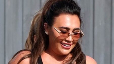 TOWIE’s Lauren Goodger is clad in head to toe designer gear as she rocks £4k Chanel bag, £730 Prada vest and £75 D&G boxer shorts for filming