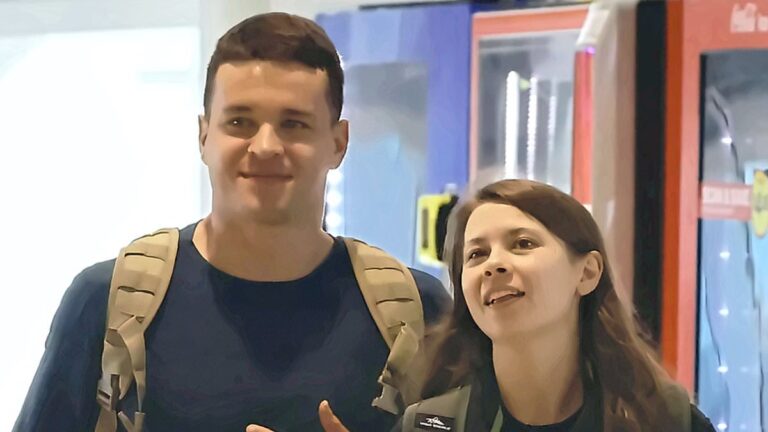 What’s so funny? Birthday girl Bindi Irwin can’t stop smiling as she’s spotted sharing a sweet moment with husband Chandler Powell at Brisbane Airport