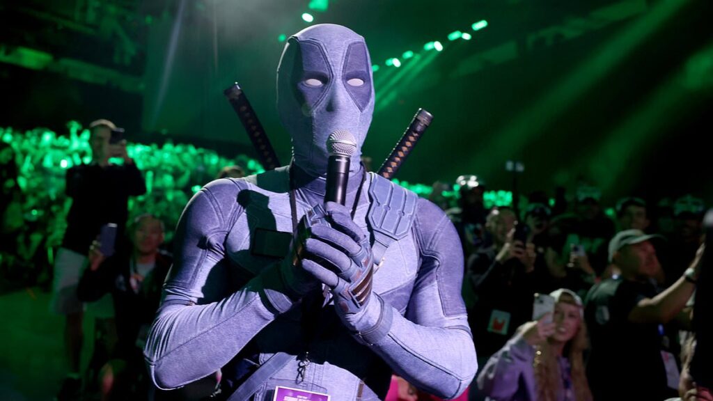 Ryan Reynolds appears in full Deadpool costume for Marvel’s Comic Con panel as fans accuse him of ‘trying too hard’