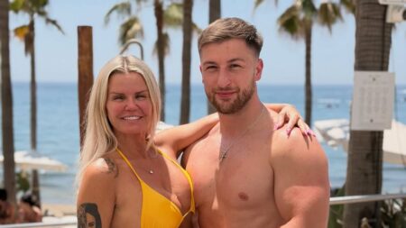 Bikini-clad Kerry Katona, 45, packs on the PDA with her toyboy boyfriend Paolo Margaglione, 33, as they enjoy a romantic beach getaway