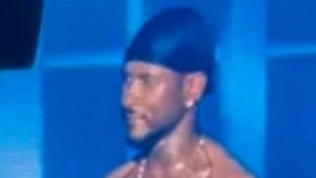 Usher kicks fan OFF STAGE after her awkward response to his seductive dance moves at Nashville concert