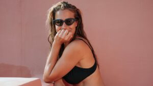 Gemma Atkinson, 41, shows off her rock hard abs in mismatching bikini on two-week family holiday