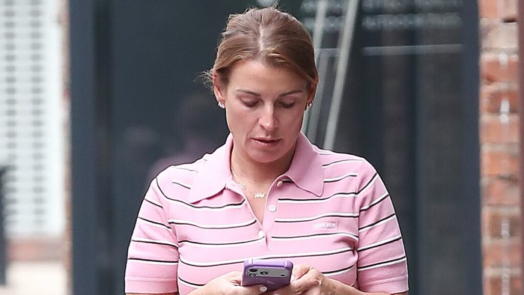 Coleen Rooney cuts a casual figure as she runs errands in a £1,400 pink polo shirt and £850 mesh pumps