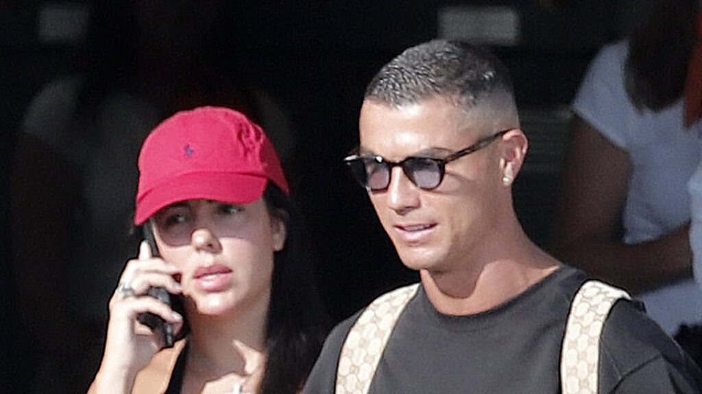 Georgina Rodríguez and Cristiano Ronaldo show off huge matching diamond rings on private jet as they are dogged by rumours they will marry in Portugal this weekend