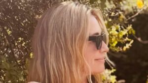 Cat Deeley shows off her gardening skills by mowing the lawn in her bikini after her intimate date with movie executive