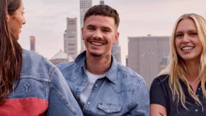 Romeo Beckham steals his father David’s style in double denim as he models for new Tommy Hilfiger campaign