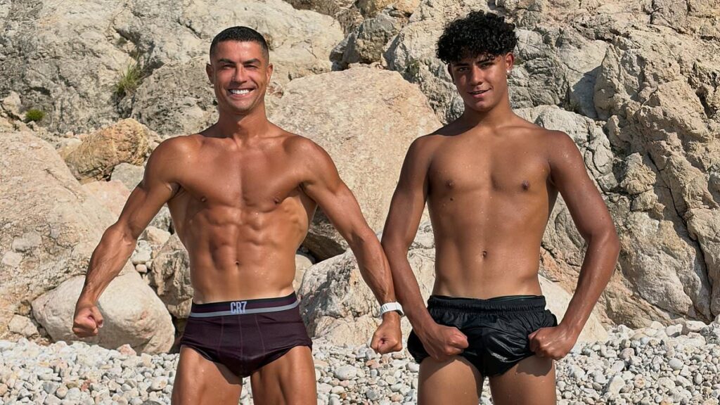 Cristiano Ronaldo poses shirtless with his lookalike son, 16, and teases him with cheeky caption ahead of rumours he’s set to wed Georgina Rodriguez