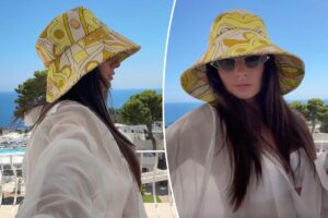 Shop the $28 Revolve bucket hat that Paige DeSorbo wore in Italy