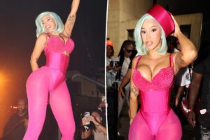 Cardi B wears waist-whittling corset and head-to-toe fuchsia