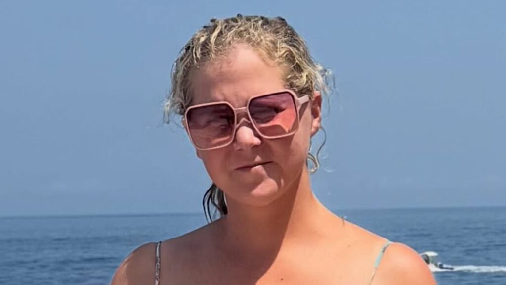 Amy Schumer shows off her 50lb weight loss in a skimpy bikini for lavish boat day