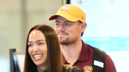 AFL star Lachie Neale steps out with rumoured new girlfriend Emma Field as pair arrive together in Brisbane after Melbourne trip – as estranged wife Jules rebuilds her life