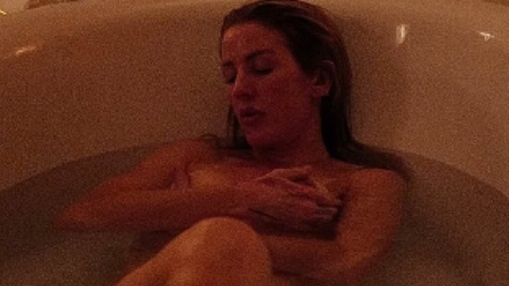 Ellie Goulding poses naked in the bath at the romantic Florence hotel that inspired her racy new track about her boyfriend Beau Minniear