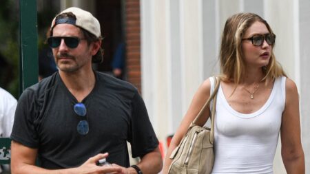 Bradley Cooper and Gigi Hadid spark rumors they secretly MARRIED as they wear rings on wedding fingers in Paris