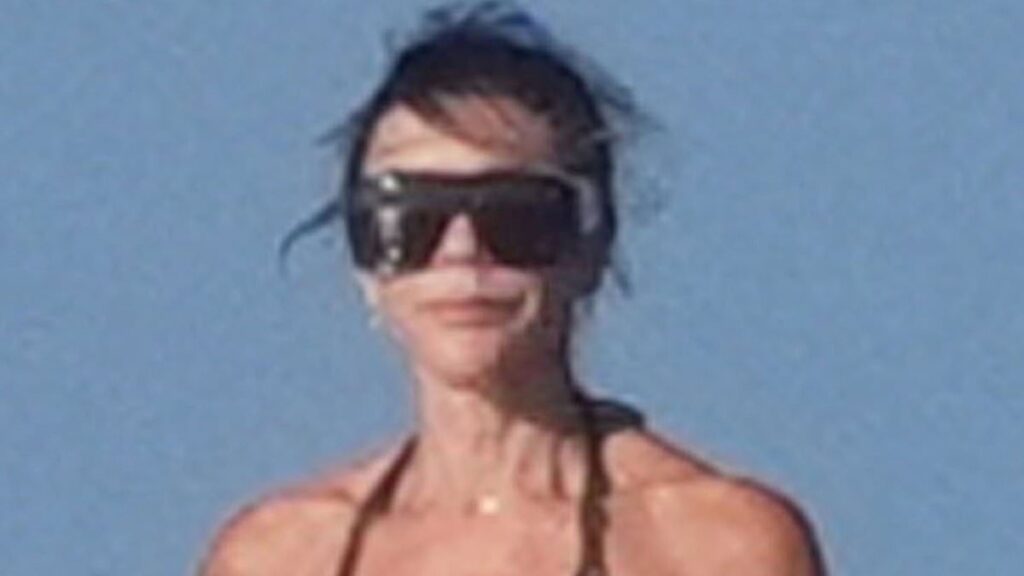 Victoria Beckham, 52, and Kim Turnbull, 25, wear matching tiny black bikinis as shirtless David, 51, tops up his tan on luxury yacht in St Tropez after estranged son Brooklyn’s latest social media jibe