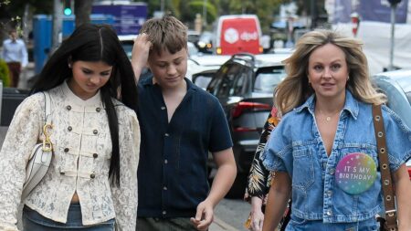 Tina O’Brien rocks double denim as she celebrates her 43rd birthday with her mini-me daughter Scarlett, 17, and son Beau, 11