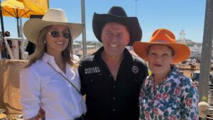 Karl Stefanovic divides fans as he poses with his wife Jasmine and Pauline Hanson at the Mount Isa Rodeo and calls them ‘the luckiest girls in the world’