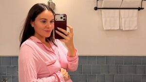 Pregnant Holly Ramsay cradles her blossoming baby bump in pink pyjamas as she shares summer photo dump