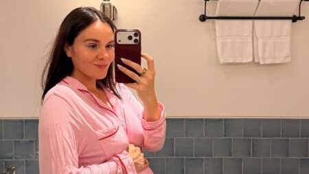 Pregnant Holly Ramsay cradles her blossoming baby bump in pink pyjamas as she shares summer photo dump