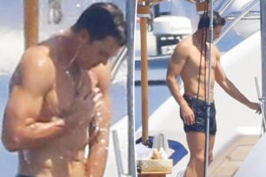 Tom Brady caught with his hand down his swimsuit during steamy yacht shower in France