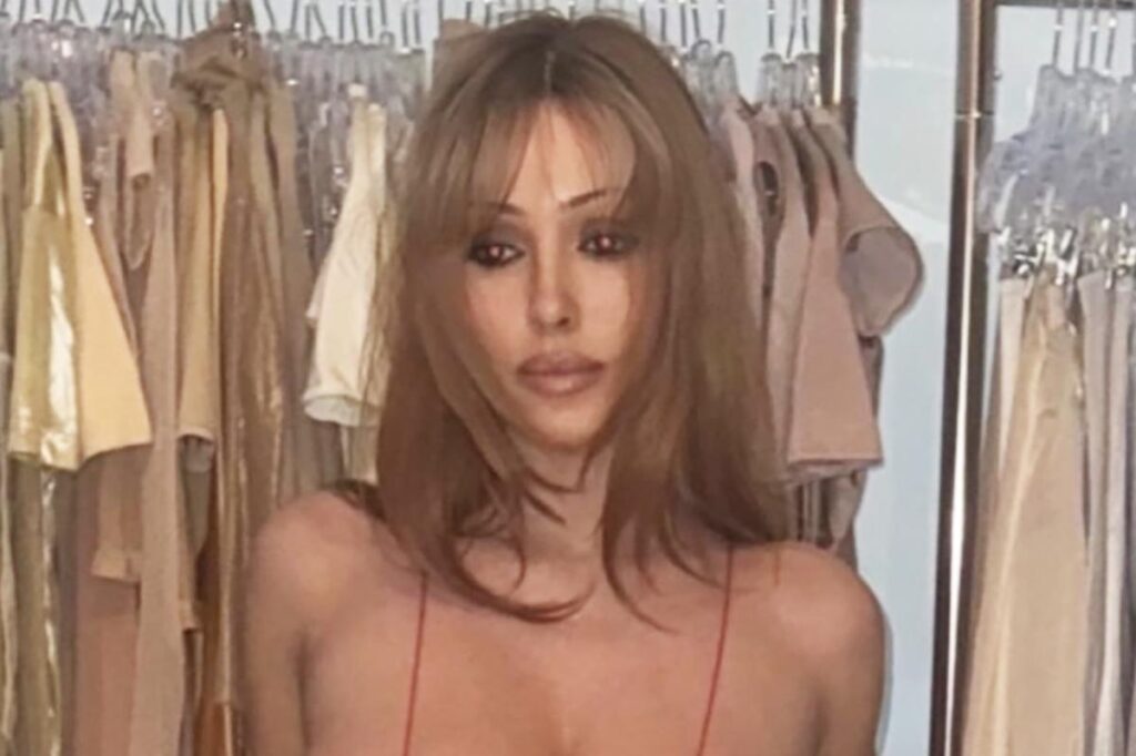 Bianca Censori defies gravity in fiery red cutout bodysuit