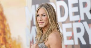 Jennifer Aniston Isn’t Putting Away This Loose, Flowy Dress Style Yet — And Neither Are We
