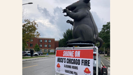 Scabby the Rat Stalks ‘Chicago’ Shows as PAs Decry Work Hour Cuts