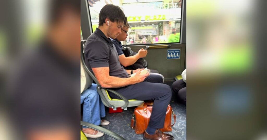 Booked and busy: Man reading on Singapore bus featured on popular Instagram page, Lifestyle News