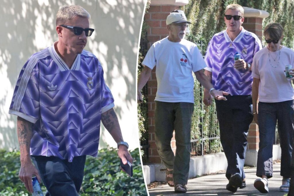 Macklemore goes on a walk with parents in Seattle amid Ed Sheeran concert debacle