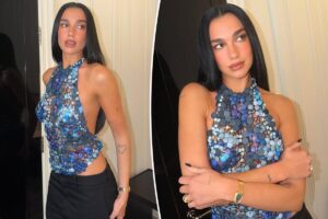 Dua Lipa wears a daring top made of nothing but buttons
