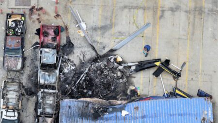 Woman Arrested on Murder Charge in Wrong-Way Bus Accident That Led to Deadly News Helicopter Crash